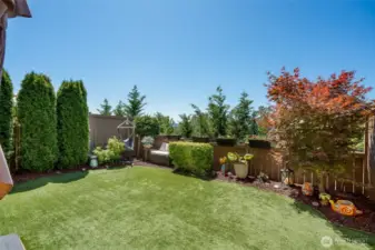 Fully fenced backyard for privacy and pets.
