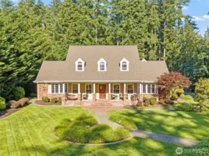 Discover this beautifully custom-built home nestled on 2 private acres.