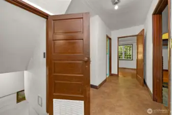 Access to the lower level through this door where you'll find a large bonus room, massive closeted storage and plenty of room for extra items.