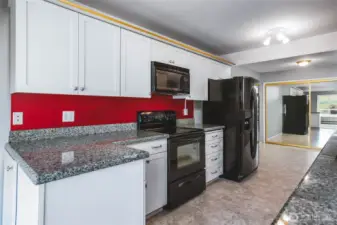 Kitchen also has Breakfast Nook with Large Hidden Pantry behind mirrored doors