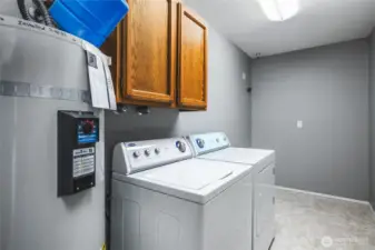 Generous Sized Laundry Room with new water heater