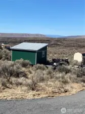 Back side of cabin looking out at the gorgeous view. You can see the lights at Mission Ridge ski lodge in the winter evenings.