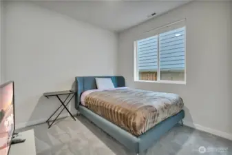 Bedroom on the main level with a 3/4 bath right next door makes a great guest room, or use as home office!