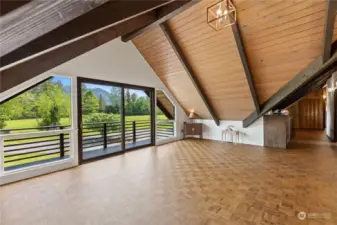 Second level living space. Beautiful parquet floors and balcony. More incredible views!