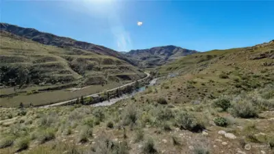 Looking West from the South Center of property. One of the flat areas here.