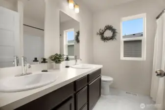 Photographs are for illustrative purposes only. Features, finishes, interior/exterior colors, landscaping and floorplan shown may vary from actual homes built.