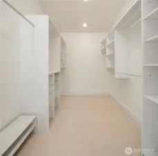 Primary walk-in closet.
