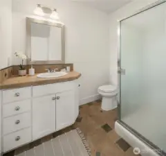 En-suite 3/4 bathroom for upstairs garden bedroom.
