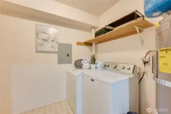 laundry room with lots of storage