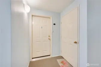 Entry door & Private storage unit on the left