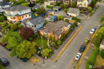 Detached garage off alley completes the package.