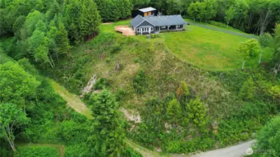 Beautiful home & shop perched on over 12 private acres overlooking the Julia Butler Hansen Refuge & Columbia River in West Cathlamet....