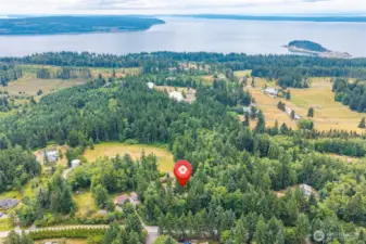 A gorgeous private setting! Island living at it's finest, situated in a quiet neighborhood with no HOA's or CCRs.