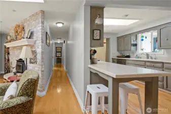 Hallway leading to the three bedrooms.