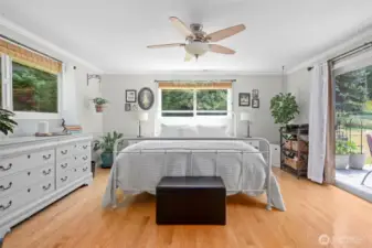 Spacious Primary bedroom with En suite. Large windows and a slider to the deck. Amazing!