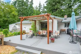 updated composite deck accessed from two different sliding doors.