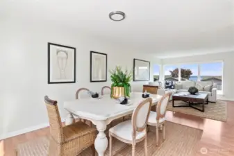 Spacious Dining Room off of the kitchen and family room with sliding door off to back porch and golf course!