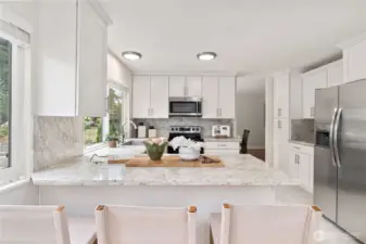 Spacious kitchen with abundance of natural light perfect for entertaining!