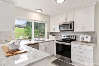 Updated kitchen with gorgeous finishes! Clean and pristine!