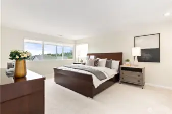 Gorgeous spacious Primary Suite with two large walk in His & Her's Closets! Balcony off of the bathroom perfect for your morning coffee!