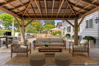 Backyard patio space with covered Mezzanine off of the 14th Hole on the Twin Lakes Golf Course!