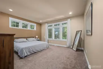 Primary bedroom with natural light and privacy..