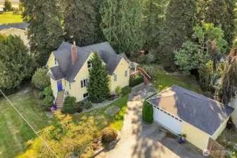 A large, flat property with a spacious detached garage