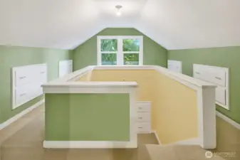 Upstairs find a landing with lots of built-in storage