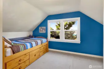 Upstairs bedroom #2 is also airy and bright