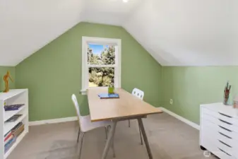 Upstairs bedroom #3 is cozy and would be a super art studio or nursery