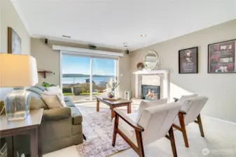 Versatile and view-filled, the lower-level recreation space is ideal for a media room, home gym, or multi-purpose lounge.