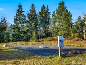 Outdoor fireplace area with subpanel.
