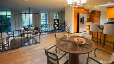 Dining area and great room, virtually staged to show potential layout of furniture.