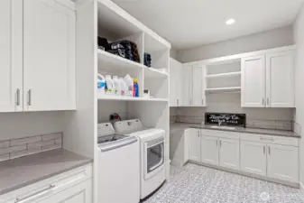 Large Laundry Room with Generous Counter Space.
