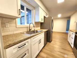 New countertops, cabinetry and new stainless sink