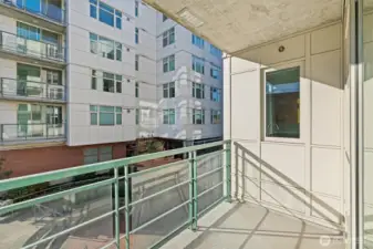 Balcony access overlooking the southwest-facing courtyard
