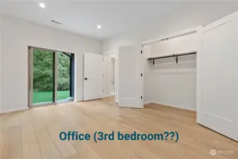 Office/den with closet and private patio