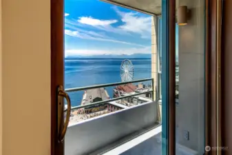 Delight in this rare, bright corner home with breathtaking sunsets to be enjoyed from both covered decks or indoors from the comfort of every room.