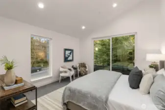 Primary Suite w/ Vaulted Ceilings.