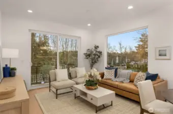 Open Concept Living Room with Expansive Windows.
