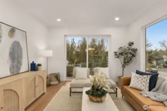 Open Concept Living Room with Expansive Windows.