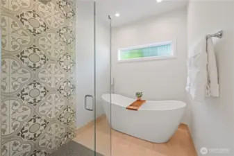 This is also the ensuite bath for the 2nd primary bedroom. The shower is a curbless entrance.