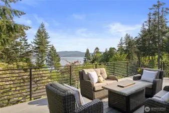 The spacious deck is another wonderful place to take in the view and unwind.