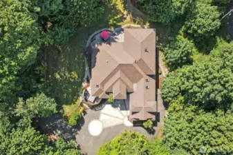 Nestled among the trees you have all the privacy you desire! Additionally, there is an existing gravel driveway to a cleared area waiting for your shop, ADU or garden oasis!