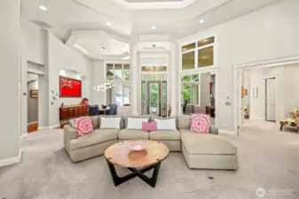 A truly custom design, this home continues the extra tall doors inside, soaring ceilings and transom windows!