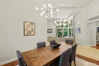 In the dining area we see upgraded modern lighting that will be seen throughout the home!
