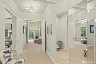 Through tall french doors you enter into the luxurious primary retreat!