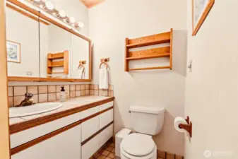 This powder bath is on the main level before teh primary bedroom.
