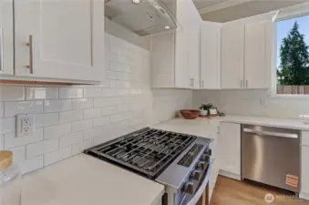Long lasting Whirlpool appliances including an easy to use range with gas cooktop and quiet dishwasher both with stainless finish.