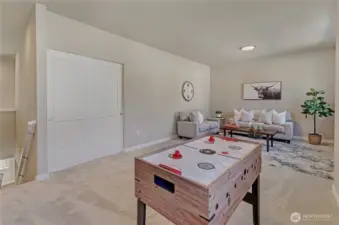 Just upstairs, a bonus area perfect for a games, movies/tv, reading a book or listening to your favorite songs.  Flexible rooms designed to enable you to decide.